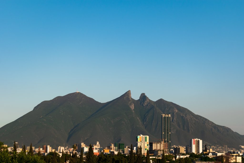 Photo of Monterrey, MX, skyline at dusk.